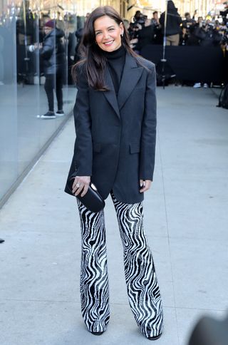 Katie Holmes black boots blazer pants winter fashion