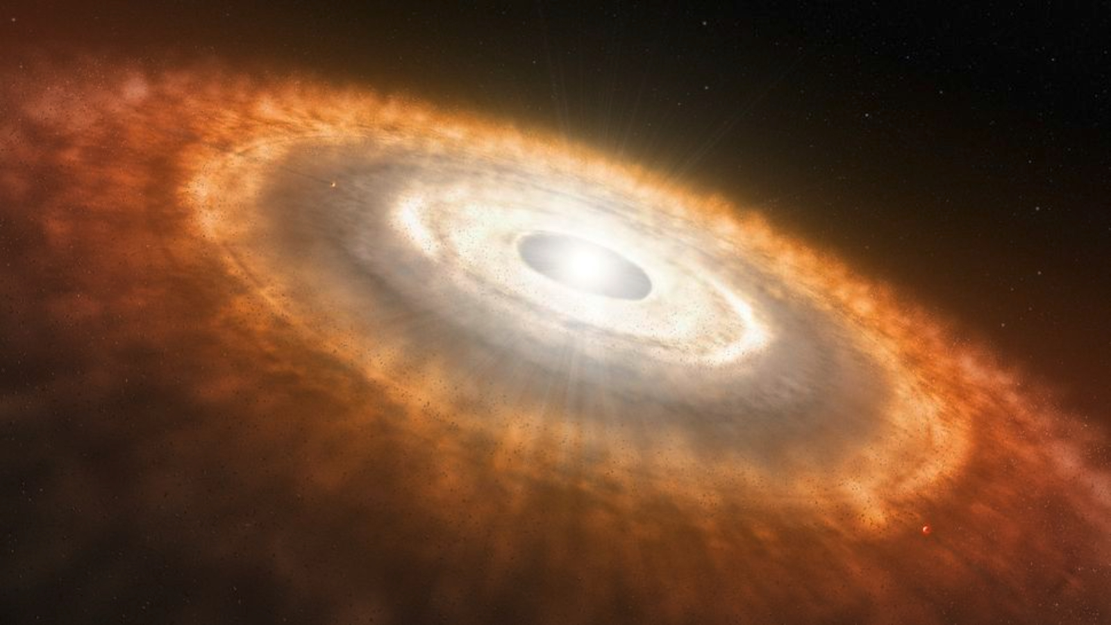 An artist's interpretation of a planetary disk swirling around a star