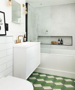 Modern bathroom with mixed-scale tiles across floor, wall and shower area