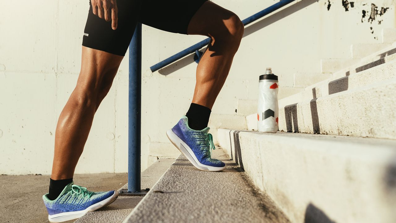 Close up of legs stretching. Fitness, workout, sport, lifestyle concept.