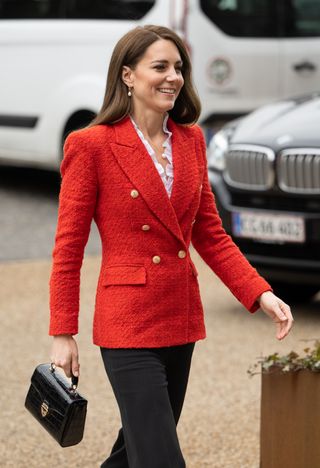 Kate Middleton carrying the Aspinal of London Mayfair Midi bag in black