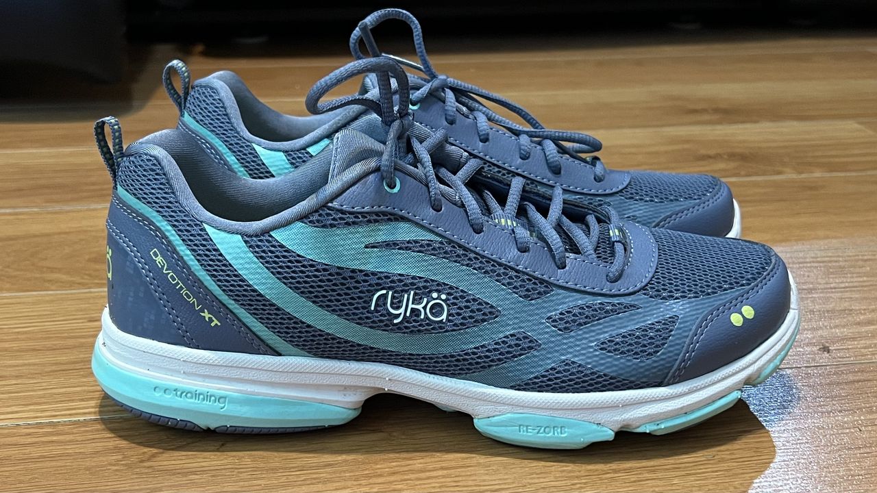 Ryka Devotion XT being worn on a wooden floor.