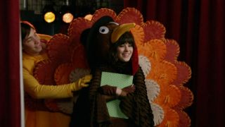 Justin Long and Zooey Deschanel dressed as Thanksgiving characters in New Girl.