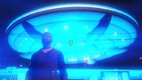 Franklin in front of an UFO, illuminated in a blazing blue light.