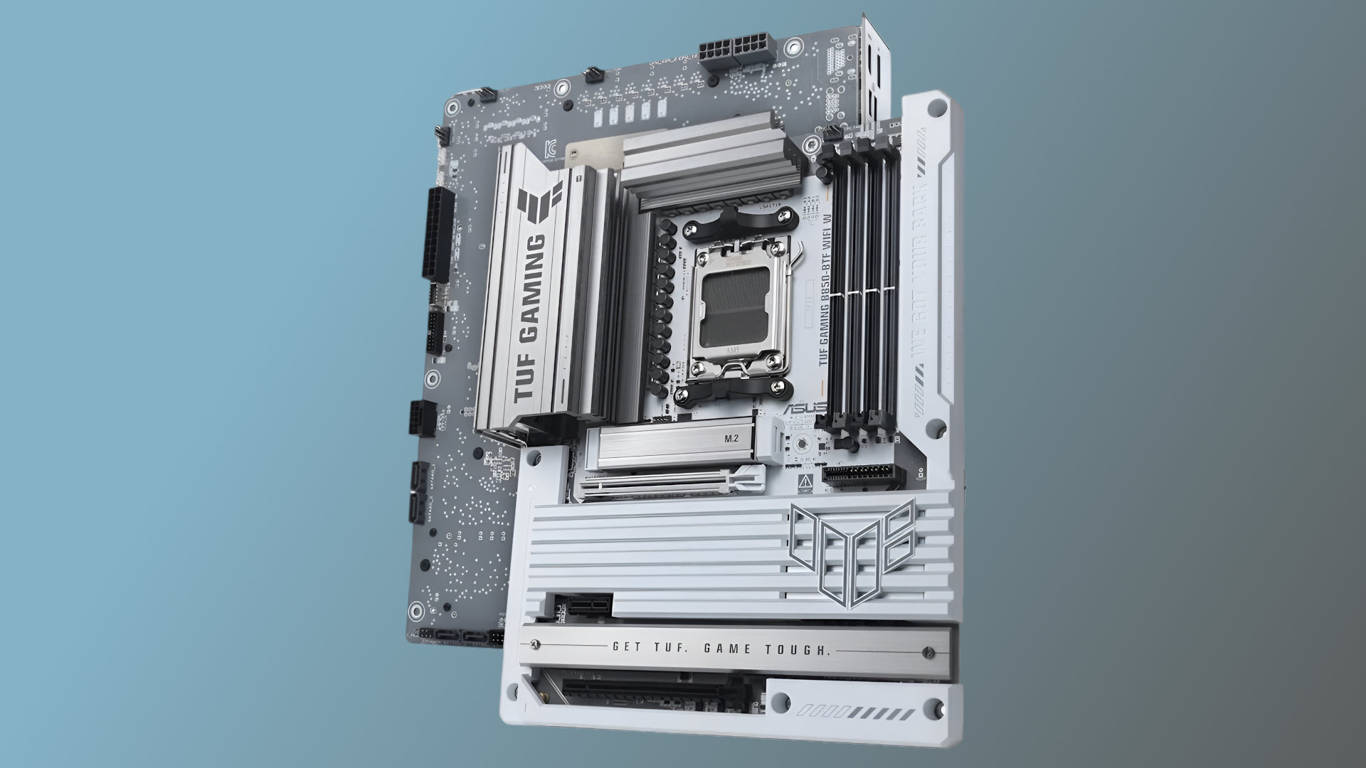 An image of an Asus TUF Gaming B580-BTF WiFi W motherboard, showing two of them back-to-back, highlighting the rear-mounted cable connectors
