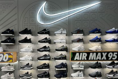 Nike shoes and logo on display at a store in France