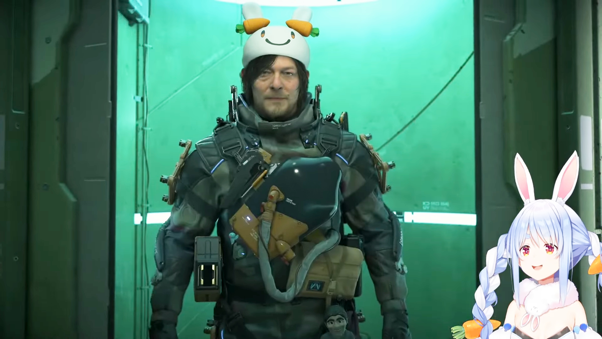 A screencap of an Usada Pekora Hololive stream where the vtuber is playing Death Stranding 2. The main character of the game is wearing a bunny hat themed after Pekora&#039;s model design.