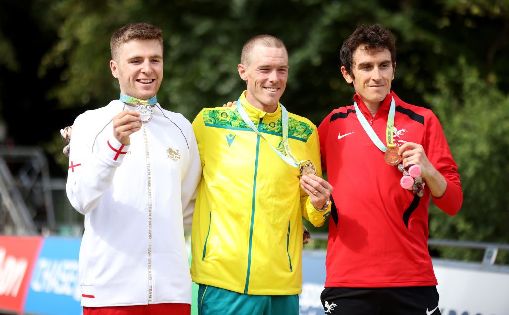 WOLVERHAMPTON ENGLAND AUGUST 04 L R Silver Medalist Fred Wright of Team England Gold Medalist Rohan Dennis of Team Australia and Bronze Medalist Geraint Thomas of Team Wales pose with their medals during the Mens Individual Time Trial medal ceremony on day seven of the Birmingham 2022 Commonwealth Games on August 04 2022 in Wolverhampton England Photo by Stephen PondGetty Images