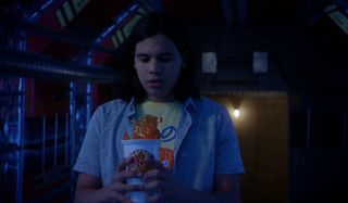 Cisco looking at a drink floating The Flash CW