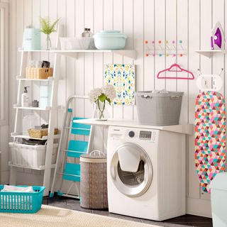 White walls laundry essentials and washing machine