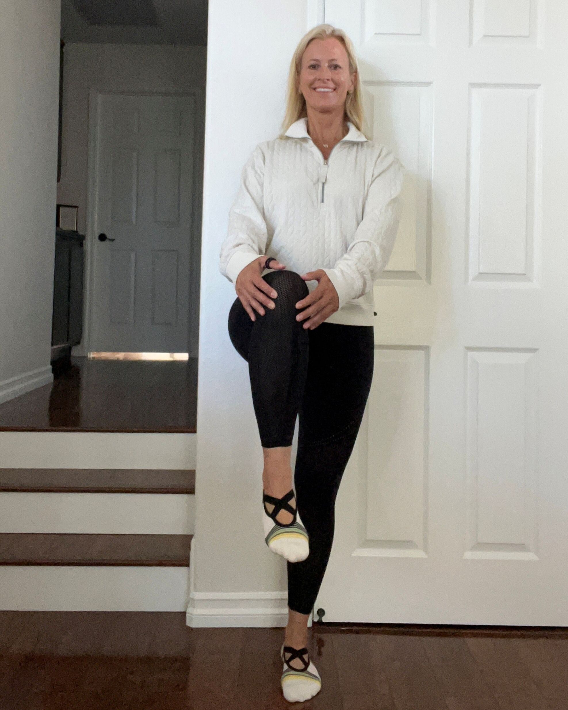 Woman lifting one leg