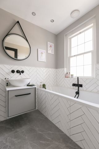 white bathroom with tiled fitted bath by BC Designs