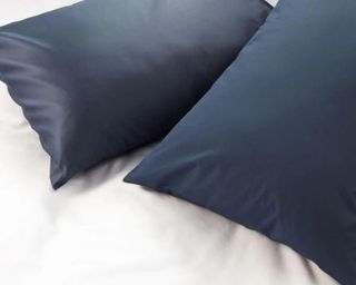 Percale and sateen pillowcase next to each other