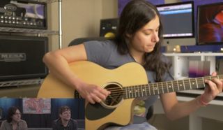 Nili Brosh plays a Martin SC line acoustic guitar