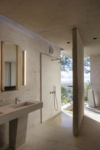 minimalist bathroom with open view from shower