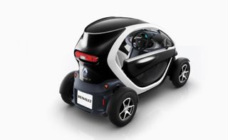 Renault's Twizy model with scissor doors showed only partially enclosing the car