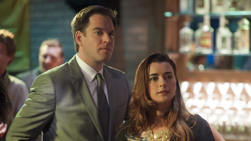 Tony and Ziva seated at a high-end bar and dressed nicely on NCIS