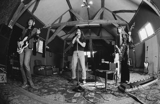 Bob DAISLEY and Randy RHOADS and Ozzy OSBOURNE, L-R: Bob Daisley, Ozzy Osbourne, Randy Rhoads, in studio recording 'Blizzard of Ozz' album