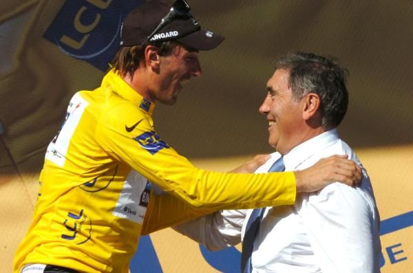 Fabian Cancellara (Saxo Bank) and Eddy Merckx