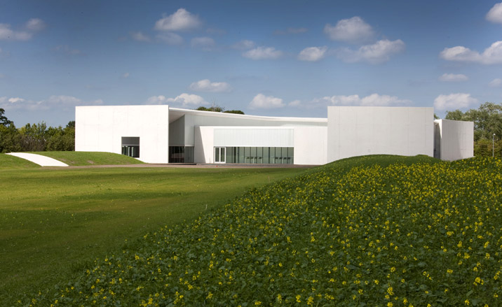 Modern white house with lawn