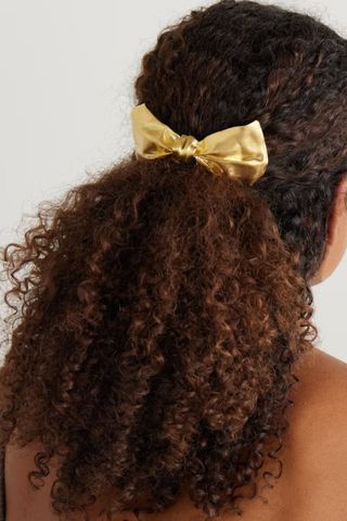 Completedworks Gold-plated bow hair comb