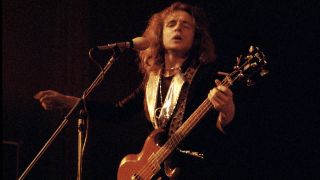 Jack Bruce of West, Bruce & Laing performs on stage in 1973 in Copenhagen, Denmark. He plays a Gibson EB-3 bass guitar