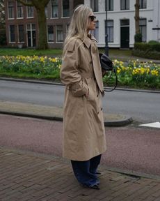 Linda Tol wearing COS trench coat