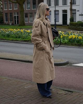 Linda Tol wearing COS trench coat