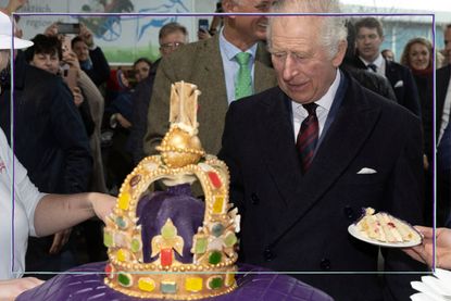 King Charles cutting cake