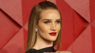 Rosie Huntington-Whiteley pictured with long and sleek straight hair whilst attending The Fashion Awards 2023 presented by Pandora at The Royal Albert Hall on December 4, 2023 in London, England.