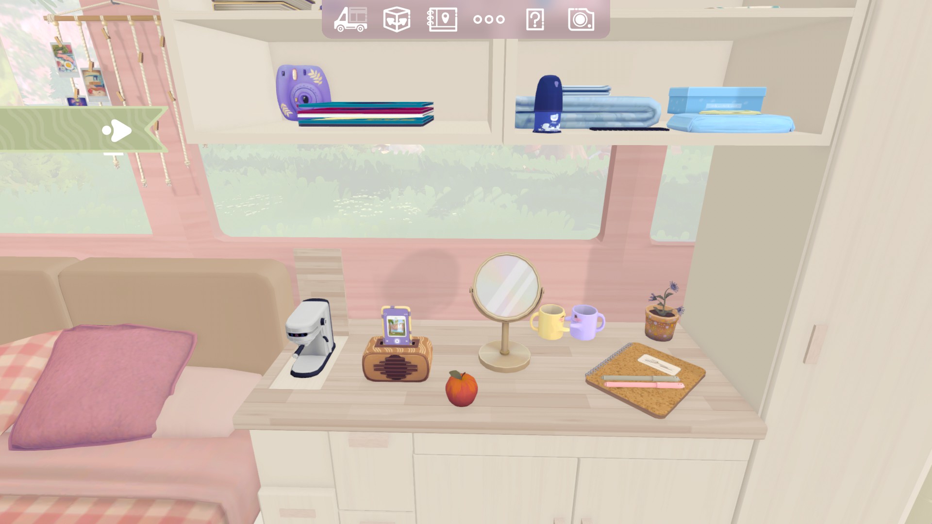 Camper Van: Make It Home screenshot showing an assortment of belongings lining shelves and sitting on the countertop inside a camper van