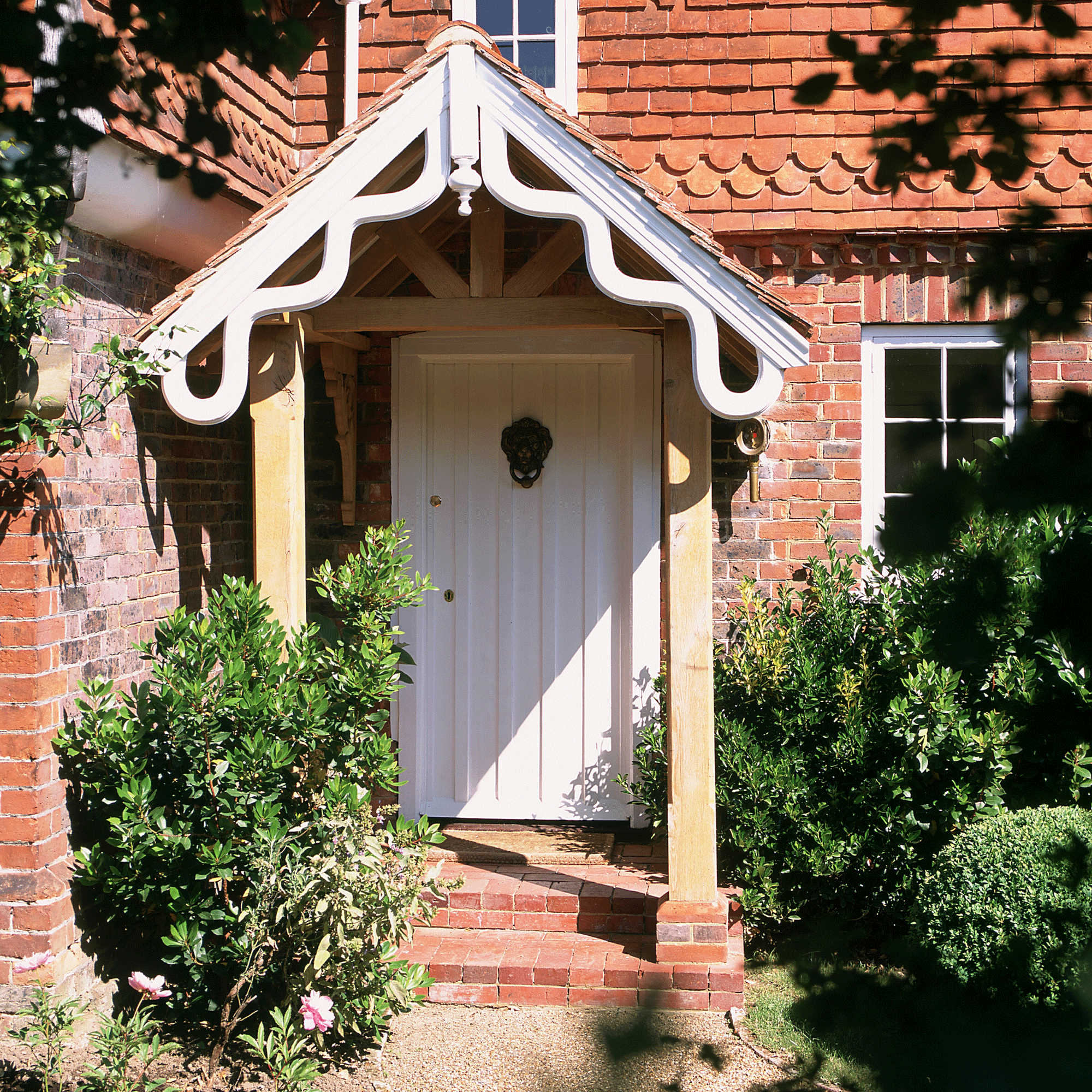 White porch with wavy trim