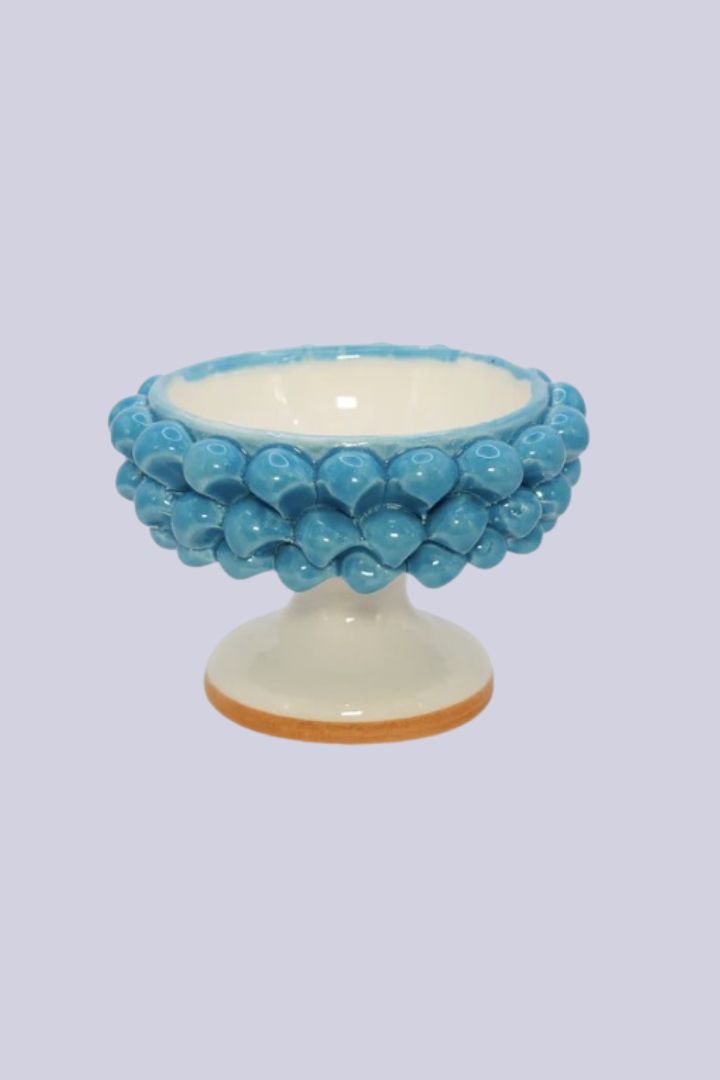 Big Mamma Crockery featured against plain colorful backgrounds.