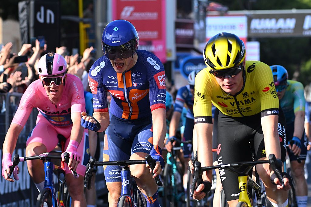 LECCE ITALY MAY 13 Casper Van Uden of Netherlands and Team Picnic PostNL C celebrates at finish line as stage winner ahead of LR Mads Pedersen of Denmark and Team Lidl Trek Pink Leader Jersey and Olav Kooij of Netherlands and Team Visma Lease a Bike during the 108th Giro dItalia 2025 Stage 4 a 189km stage from Alberobello Pietramadre to Lecce UCIWT on May 13 2025 in Lecce Italy Photo by Tim de WaeleGetty Images