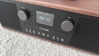 Pure Classic C-D6 DAB/FM Radio, CD player, Bluetooth speaker on a carpet