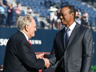 Tiger Woods shaking the hand of Jack Nicklaus at St. Andrews