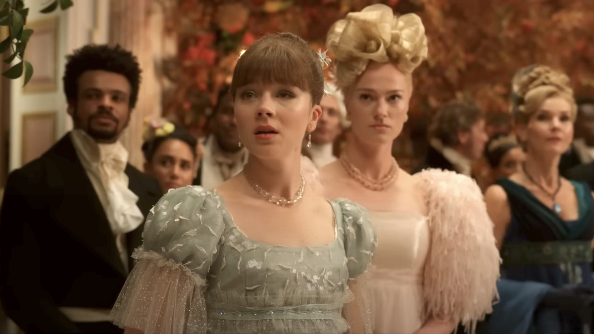 eloise and cressida cowper looking surprised on bridgerton season 3