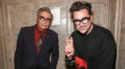 Eugene Levy and Dan Levy are seen during the &quot;Best Wishes, Warmest Regards&quot; book launch at The Beacon Theatre on October 25, 2021 in New York City.