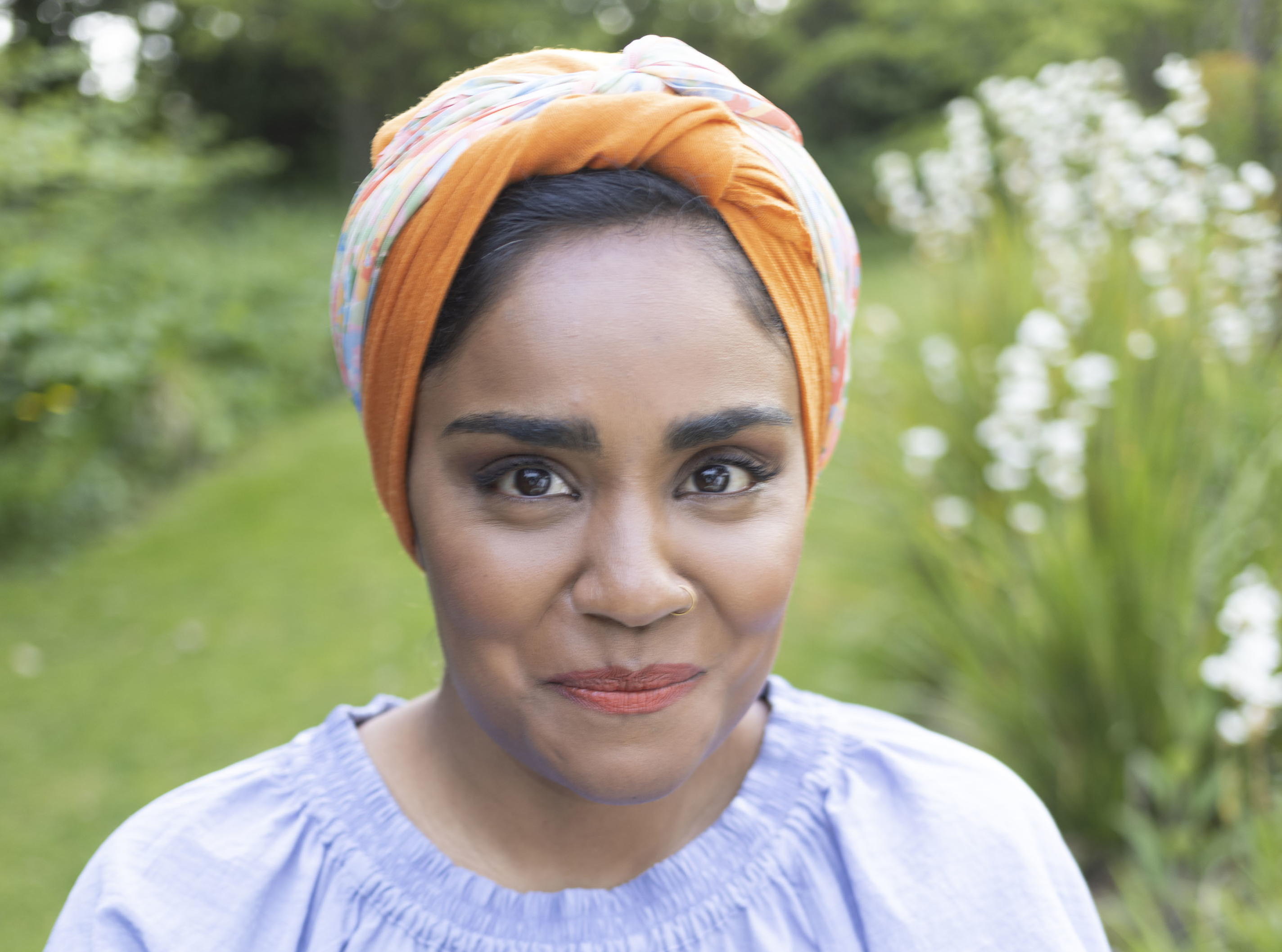 Nadiya enjoys afternoon tea and cake.