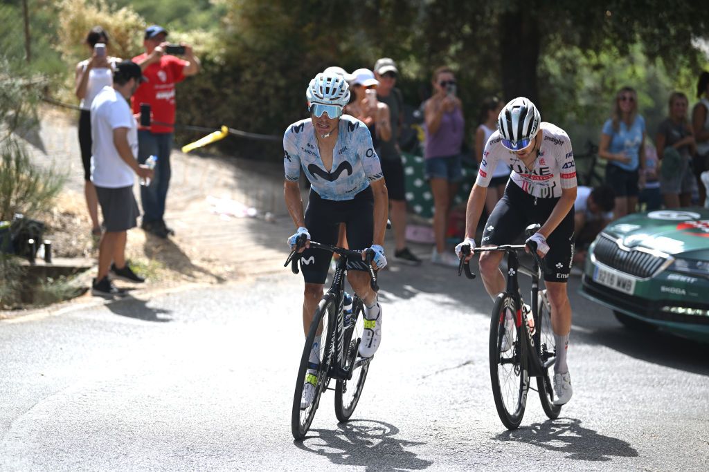 GRANADA SPAIN AUGUST 25 LR Enric Mas of Spain and Team Movistar and Pavel Sivakov of France and UAE Team Emirates compete in the chase group during the La Vuelta 79th Tour of Spain 2024 Stage 9 a 1785km stage from Motril to Granada UCIWT on August 25 2024 in Granada Spain Photo by Dario BelingheriGetty Images