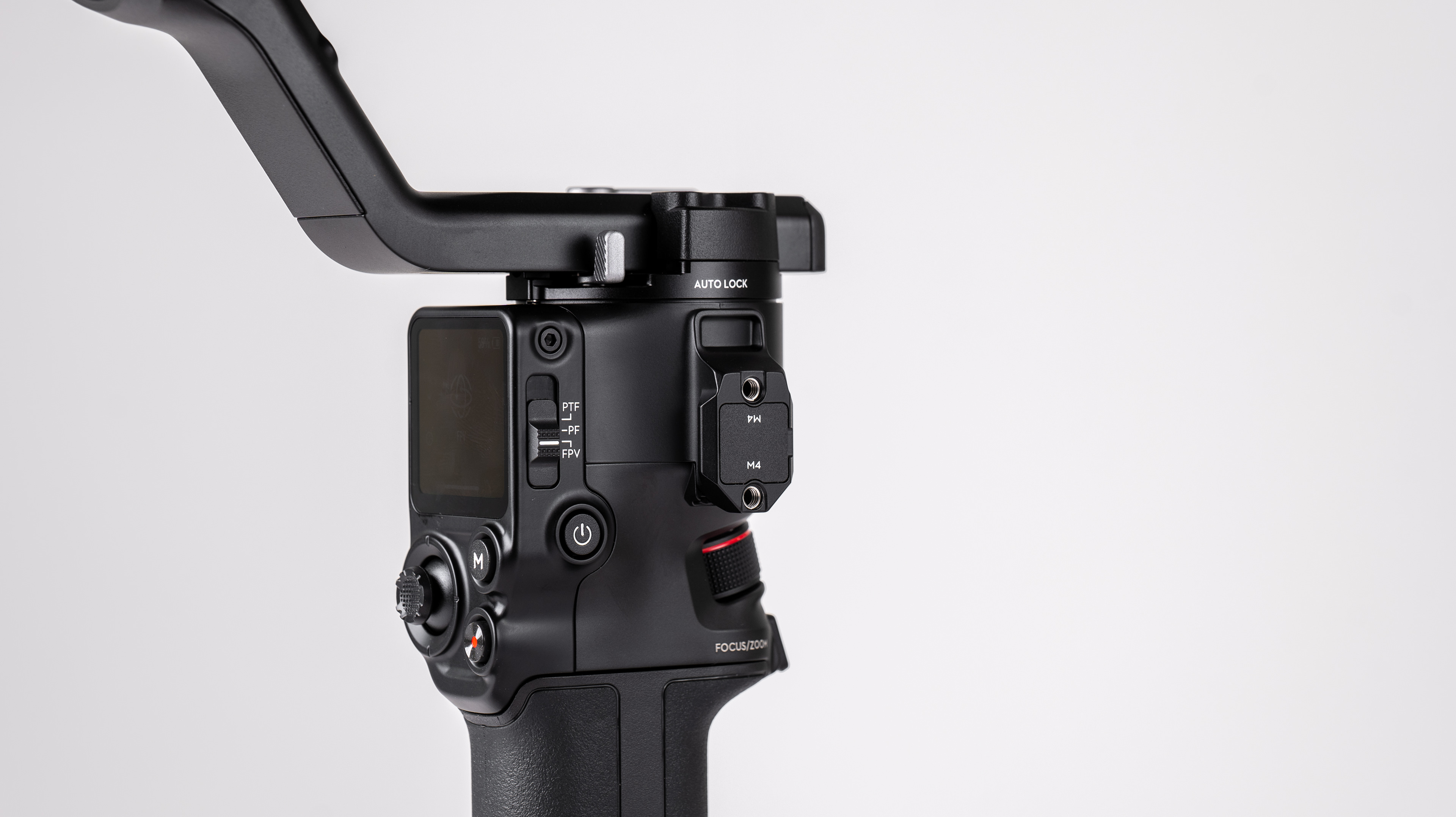 DJI RS 4 gimbal on a off-white background