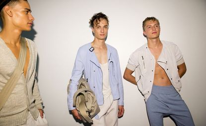 Three male models showing top of their chests