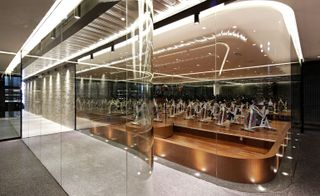 Curved glass walls allow light to flow.