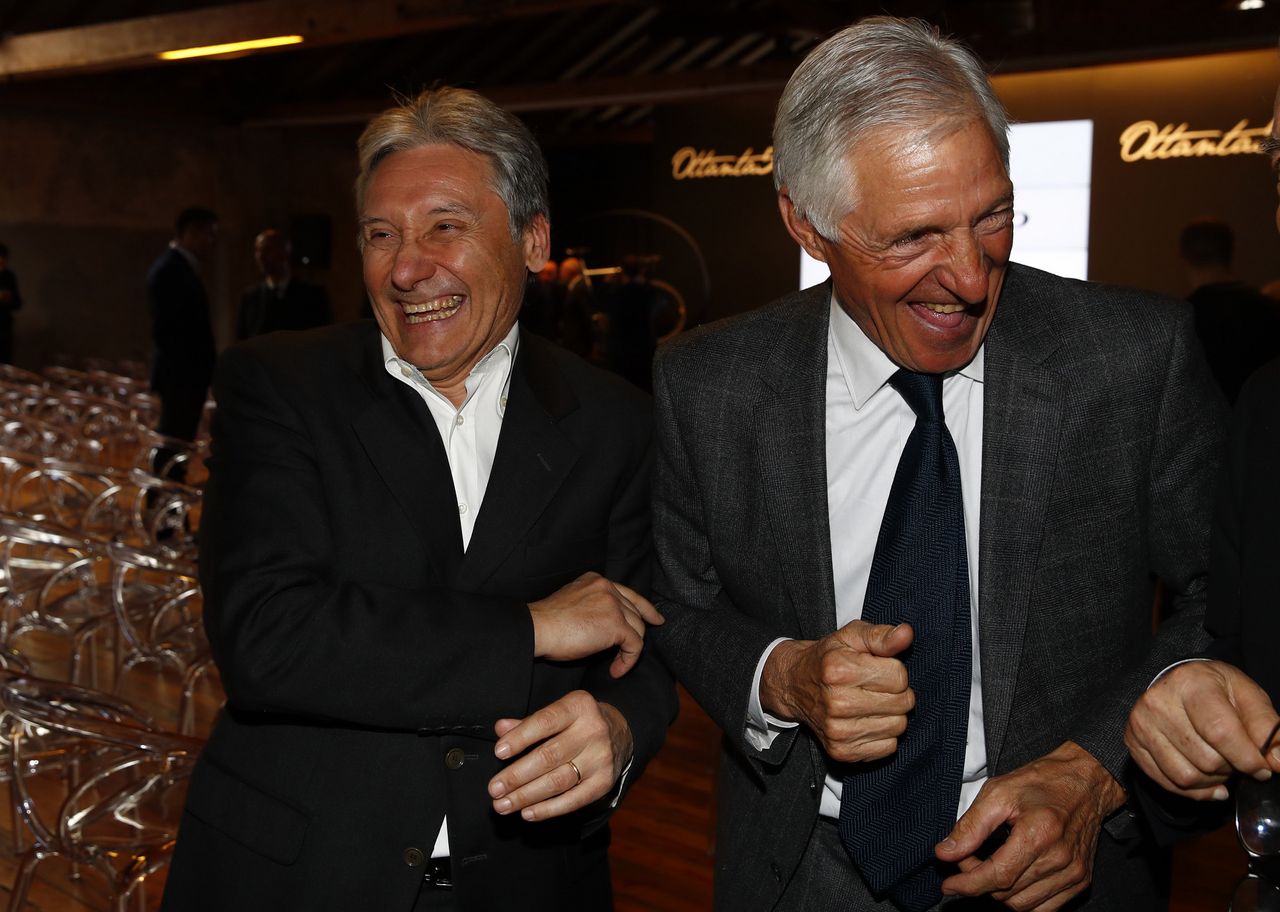Giuseppi Saronni and Francesco Moser share a joke