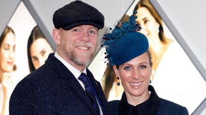 Mike Tindall and Zara Tindall attend day 2 'Ladies Day' of the Cheltenham Festival at Cheltenham Racecourse on March 16, 2022 in Cheltenham, England. 