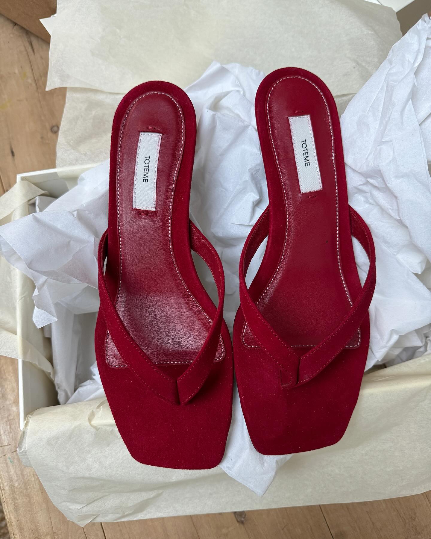 Monikh image of red toteme thong sandals