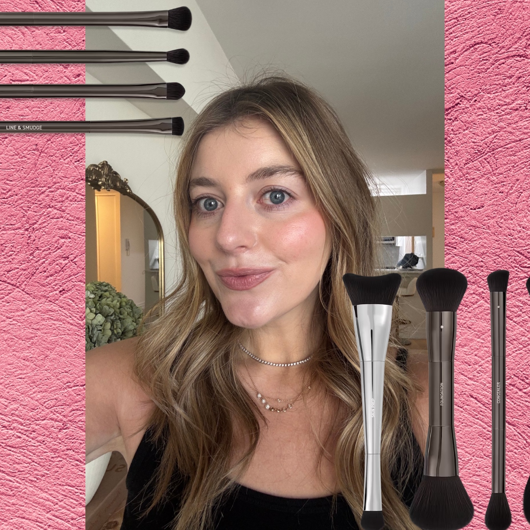samantha holender with her makeup done on a pink background next to a set of makeup brushes
