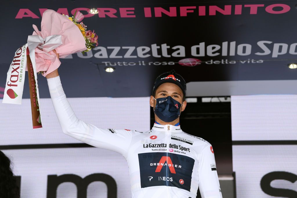 TURIN ITALY MAY 08 Filippo Ganna of Italy and Team INEOS Grenadiers white best young jersey celebrates at podium during the 104th Giro dItalia 2021 Stage 1 a 86km Individual Time Trial stage from Torino to Torino Mask Covid safety measures ITT girodiitalia Giro on May 08 2021 in Turin Italy Photo by Tim de WaeleGetty Images