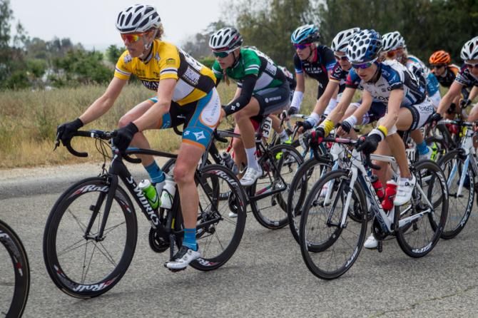Alison Powers (NOW and Novartis) stayed safe in the field to take the stage win and keep the yellow jersey.