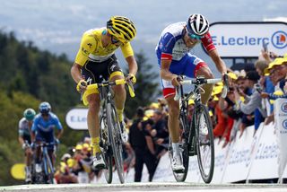 Thibaut Pinot and Julian Alaphilippe battle for seconds on the line of stage 6 at the Tour de France
